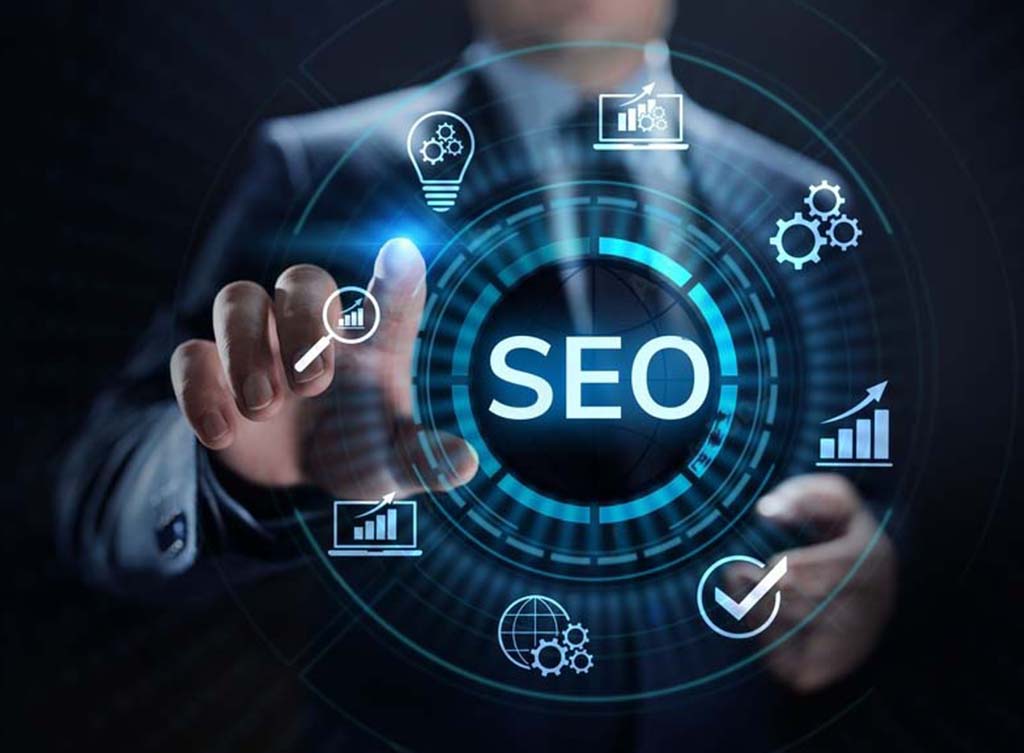 an image of a man torso in a suit interacting with a halogram showing text saying SEO and SEO icons in a circle around it